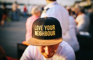 'love your neighbour' hat