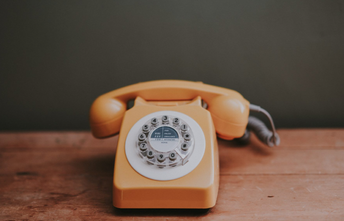 Old orange Telephone