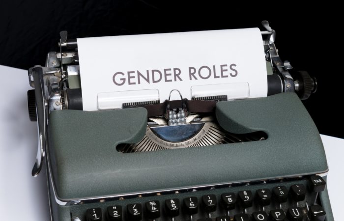 old fashioned type writer typed out Gender Roles