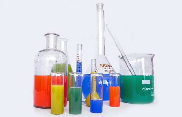 science beakers full of colorful liquids