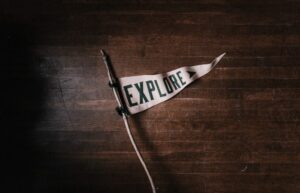 flag that says "explore"